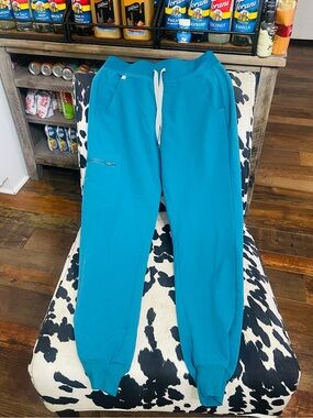 Women’s  Teal Drawstring Jogger scrubs. FIGS